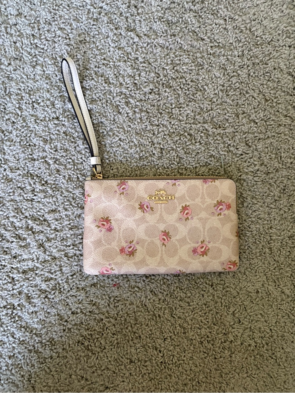COACH Pink Floral Signature Wristlet with Gold Logo